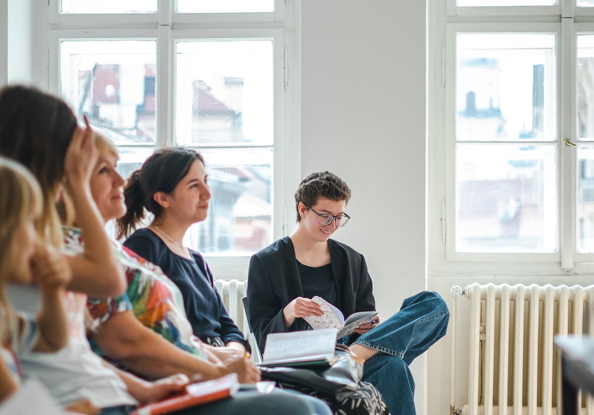 An engaged group at a wellness seminar (temporary stock photo)